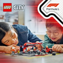 F1® pitstop en pitcrew met Ferrari auto
